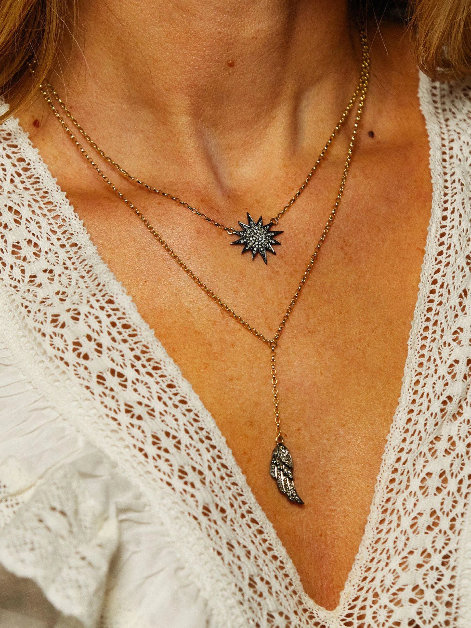 Diamond and gold starburst necklace