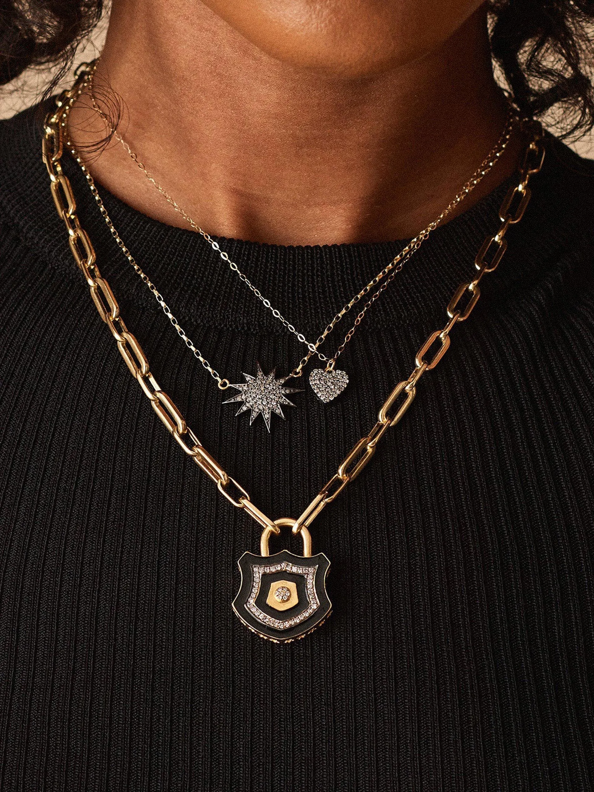 Diamond and gold starburst necklace